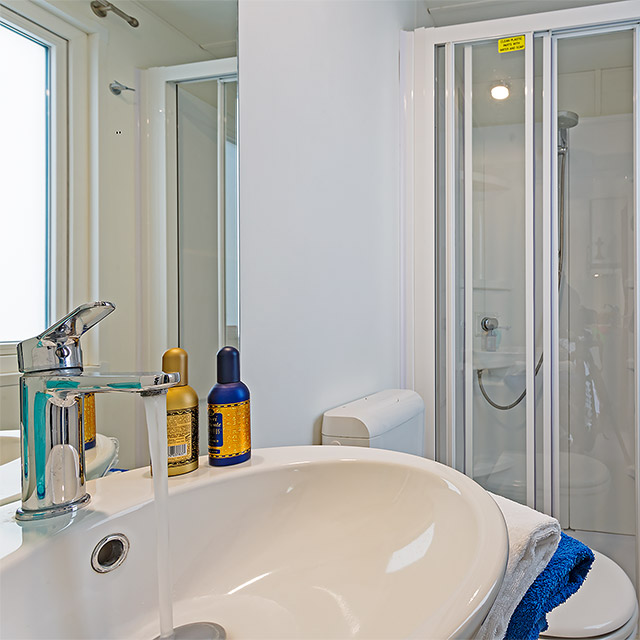 Bathroom in the Superior Bungalow with shower, toilet and sink