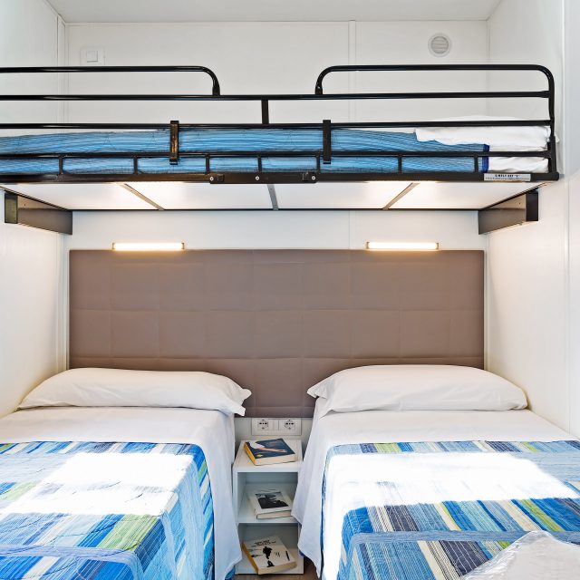 Triple room in the Superior Bungalow at Camping Cala Ginepro